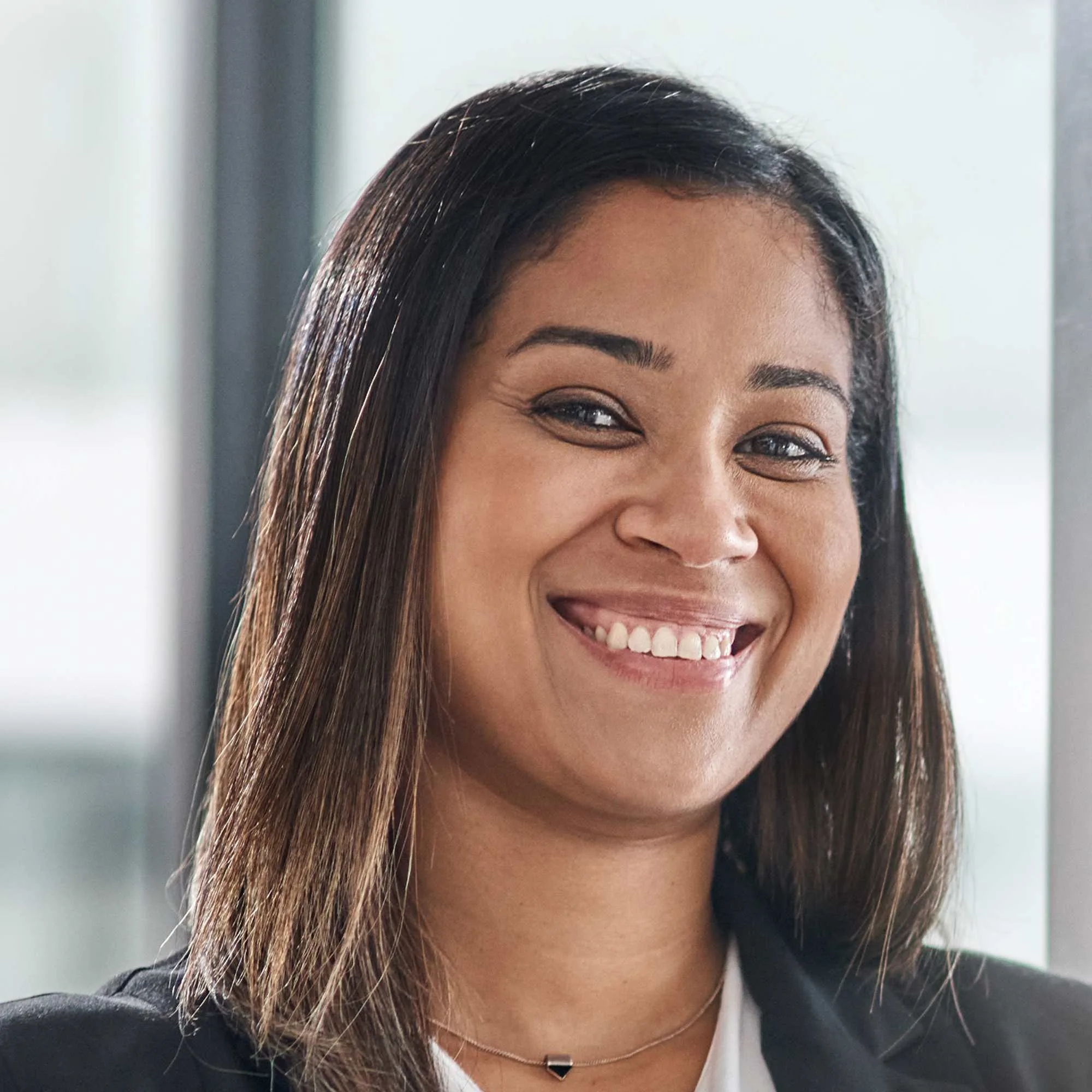 portrait-of-a-confident-young-businesswoman-standi-VFNH2HP.jpg
